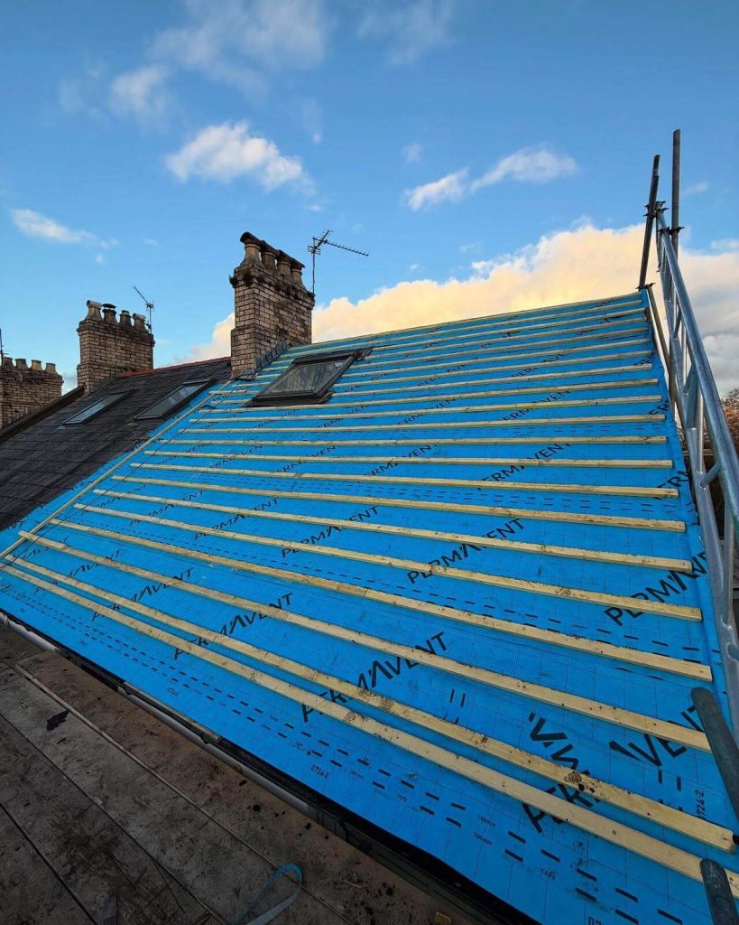 roofers installing a new roof